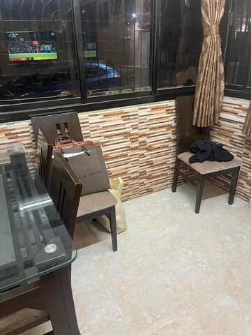 Living Room in 1 BHK Apartment at Self Help CHS, Vile Parle West – for Rent