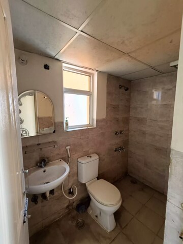 Bathroom in 2 BHK Apartment at Wave Dream Homes, Wave City – for Rent