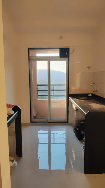 Kitchen in 1.5 BHK Apartment at Godrej Emerald, Ghodbunder Road – for Rent
