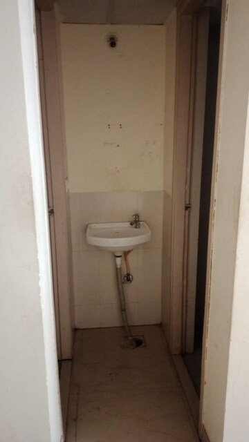 Bathroom in 1 BHK Apartment at Lodha Crown Taloja Quality Homes, Dombivli East – for Rent