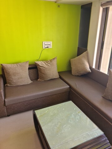 Living Room in 2 BHK Apartment at Montreal Tower, Andheri West – for Rent
