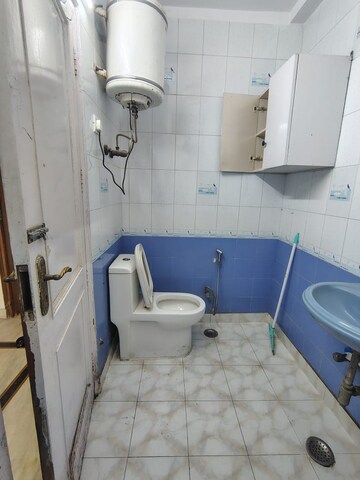 Bathroom in 2 BHK Builder Floor at Khirki Extension – for Sale