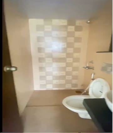 Bathroom in 2 BHK Apartment at JP Codename Hotcake, Mira Road – for Sale