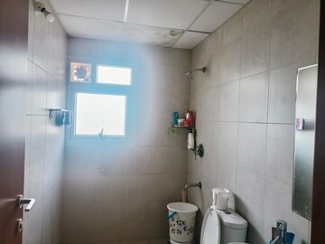 Bathroom in 2 BHK Apartment at Bhartiya Nikoo Homes, Thanisandra Main Road – for Rent