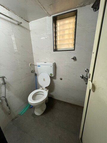 Bathroom in 2 BHK Apartment at Vihang Valley Phase 3, Kasarvadavali – for Rent