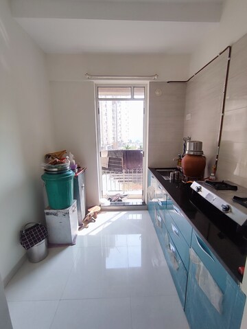 Kitchen in 1 BHK Apartment at Puranik Aarambh, Ghodbunder Road – for Rent