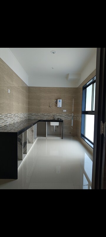 Kitchen in 3 BHK Apartment at Rajesh Raj Infinia, Malad West – for Rent