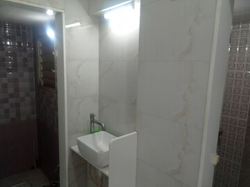 Bathroom in 1 BHK Apartment at Amber CHS, Mira Road East – for Rent