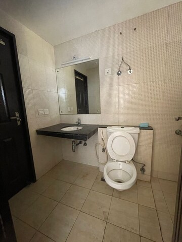 Bathroom in 2 BHK Apartment at Great Value Sharanam, Sector 107 – for Rent