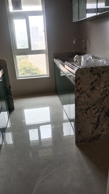 Bathroom in 2 BHK Apartment at Bhanu Jyoti CHS, Malad East – for Rent