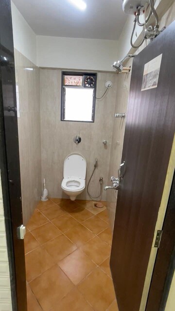 Bathroom in 2 BHK Apartment at Mohini Grace CHS, Andheri West – for Rent