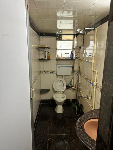 Bathroom in 2 BHK Apartment at MidCity Navsonnarbala, Bandra West – for Rent