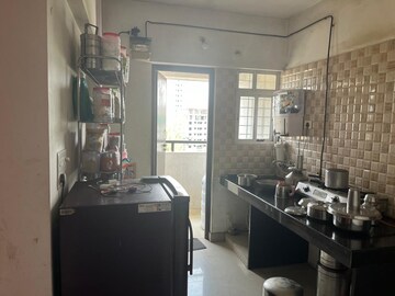 Kitchen in 1 BHK Apartment at Sara Orchid, Chakan – for Sale
