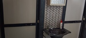 Bathroom in 1 BHK Apartment at Jai Mata Di Complex, Kalher – for Sale