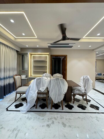 Living Room in 4 BHK Apartment at Nirman Nagar – for Sale