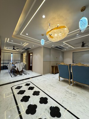 Living Room in 4 BHK Apartment at Nirman Nagar – for Sale