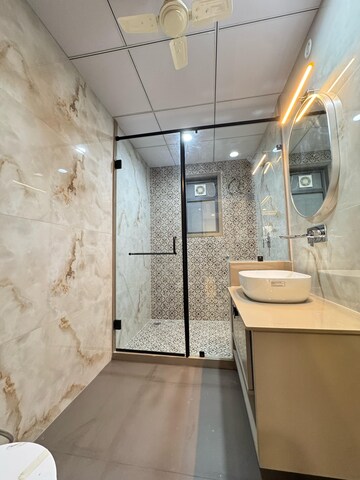 Bathroom in 4 BHK Apartment at Nirman Nagar – for Sale