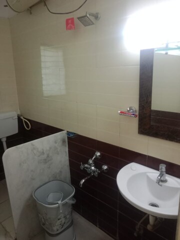 Bathroom in 1 BHK Apartment at Naiknavare Trinity Court, Koregaon Park – for Rent