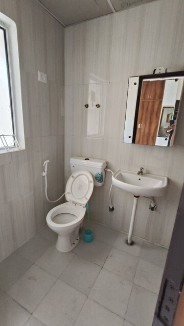Bathroom in 2 BHK Apartment at Signature Global Proxima, Sector 89 – for Rent