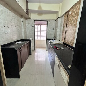 Kitchen in 1 BHK Apartment at Shree Om Jay Maheshwar, Kandarpada – for Sale