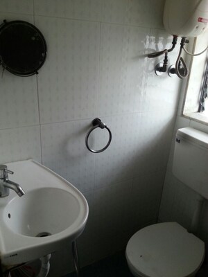 Bathroom in 2 BHK Apartment at Ani Anu Sri Balaji Enclave, Malad West – for Sale