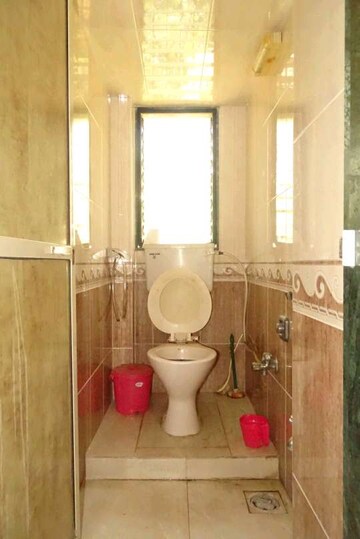 Bathroom in 1 BHK Apartment at Manish Krishna CHS, Andheri West – for Rent