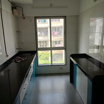 Kitchen in 1 BHK Apartment at RNA NG Paradise, Ketkipada – for Rent