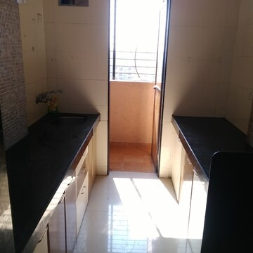 Kitchen in 1 BHK Apartment at Raj Mandir Complex, Ketkipada – for Rent