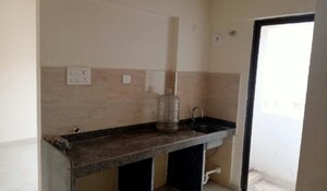 Kitchen in 1.5 BHK Apartment at Sunteck West World, Naigaon East – for Sale