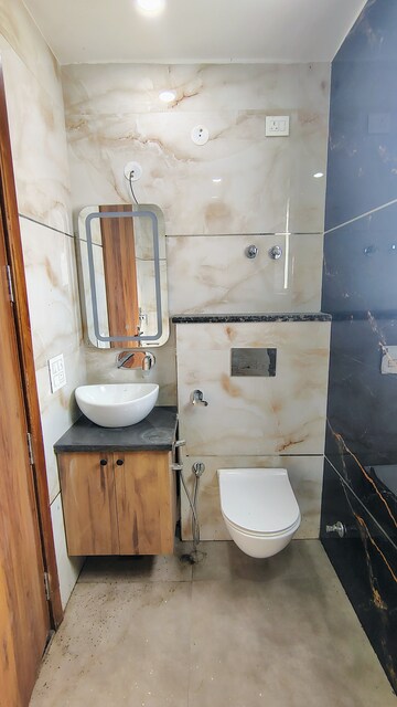 Bathroom in 3 BHK Builder Floor at Hong Kong Bazaar, Sector 57 – for Rent