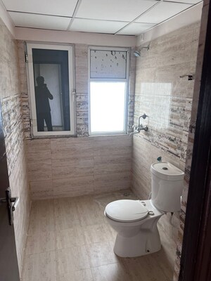 Bathroom in 2 BHK Apartment at Amrapali Golf Homes, Sector 4 Greater Noida – for Sale