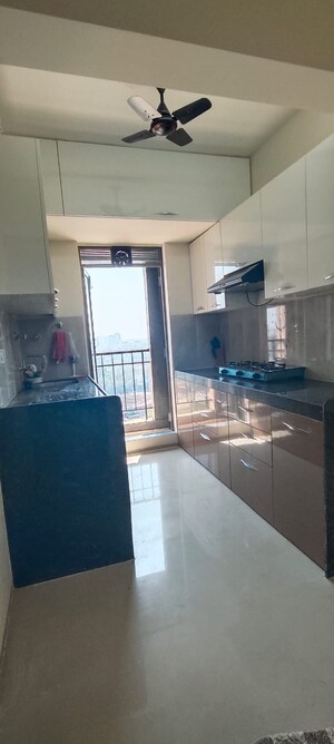 Kitchen in 2 BHK Apartment at Rustomjee Global City, Virar West – for Sale