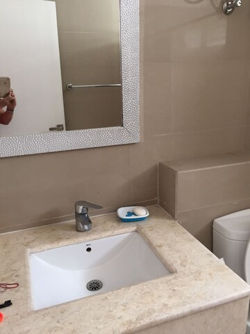 Bathroom in 2.5 BHK Apartment at Krisumi Waterfall Residences, Sector 36a – for Sale