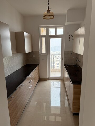 Kitchen in 2 BHK Apartment at Tech Zone 4 Greater Noida – for Rent