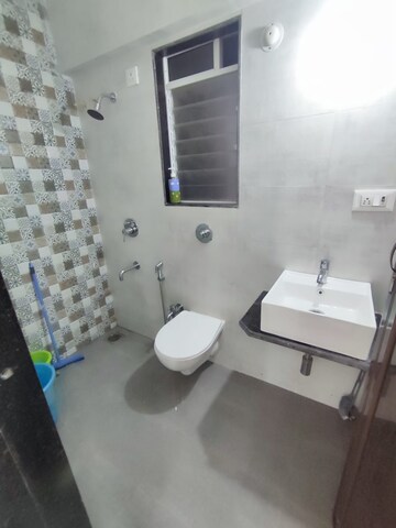 Bathroom in 1 BHK Apartment at Raunak Heights, Ghodbunder Road – for Rent