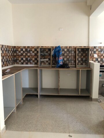 Kitchen in 2 BHK Apartment at Ahad Serenity, Rayasandra – for Rent