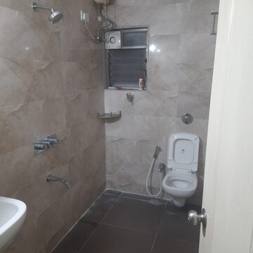 Bathroom in 3 BHK Apartment at Cosmos Horizon Phase 2, Pokhran Road No 2 – for Rent