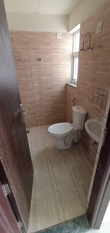 Bathroom in 3 BHK Apartment at Adore Happy Homes Grand, Sector 85 – for Sale