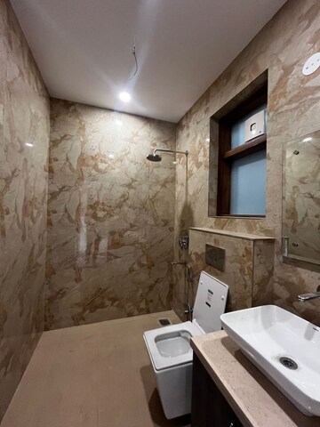 Bathroom in 3 BHK Apartment at Adani Samsara Vilasa, Sector 63 – for Rent