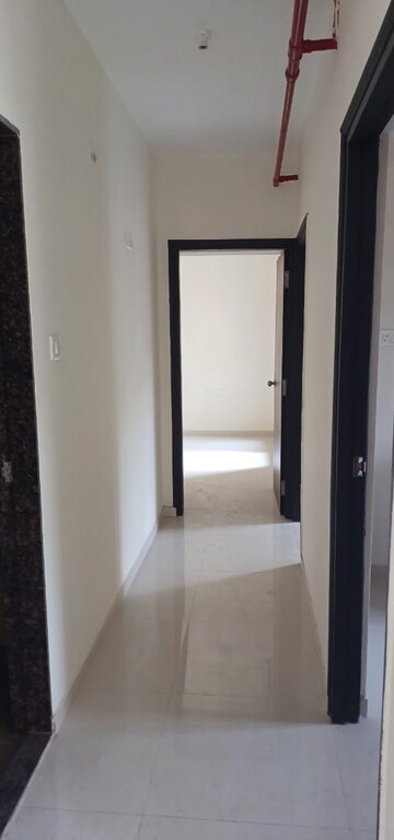 Building Lobby in 1.5 BHK Apartment at Dosti Planet North, Shilphata – for Rent