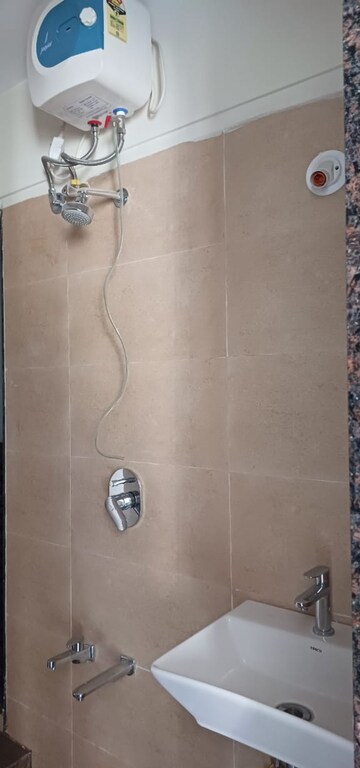 Bathroom in 1.5 BHK Apartment at Dosti Planet North, Shilphata – for Rent