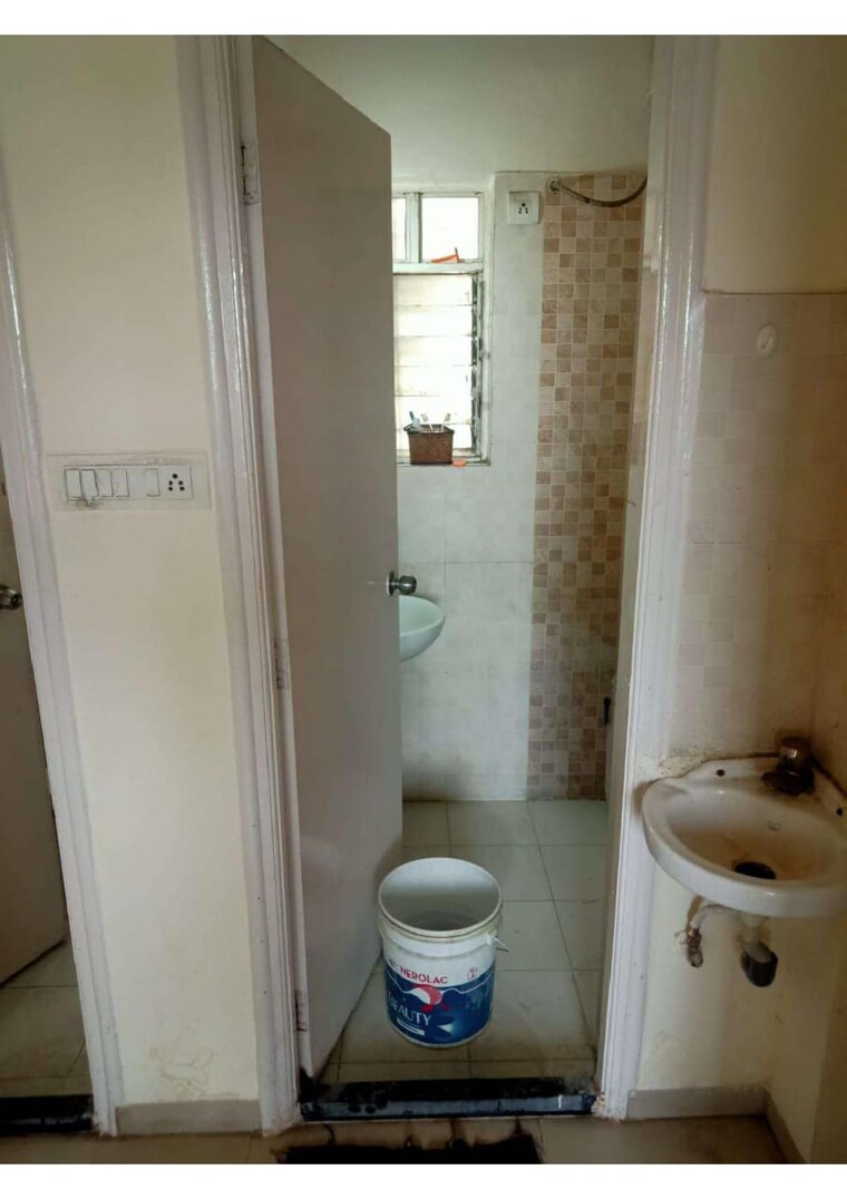 Bathroom, sky-heights 1 Bedroom 645 Sq.Ft. Apartment In Undri Pune 8464133