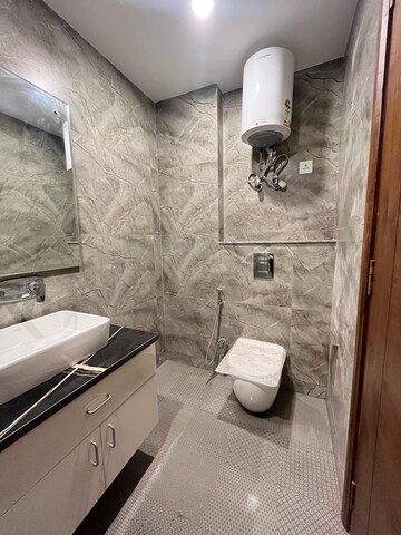 Bathroom in 3 BHK Builder Floor at Kalkaji – for Rent