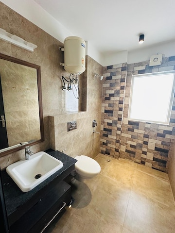Bathroom in 4 BHK Apartment at Oasis Apartments, Sector 55 – for Rent
