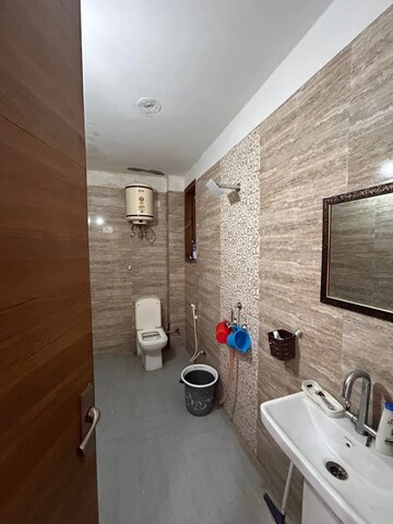 Bathroom in 3 BHK Builder Floor at RWA Tomar Colony, Mukundpur – for Sale