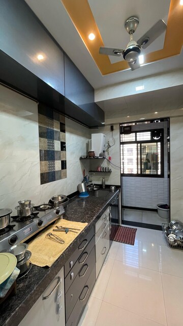 Kitchen in 2 BHK Apartment at Leena  Bhairav Residency, Mira Road – for Sale