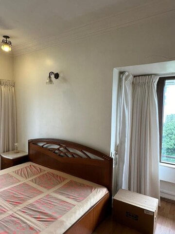 Bedroom in 3 BHK Apartment at Peddar Road – for Sale