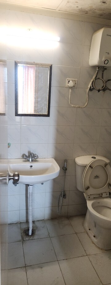 Bathroom in 2 BHK Apartment at Eros Sampoornam III, Sector 2 Greater Noida – for Rent