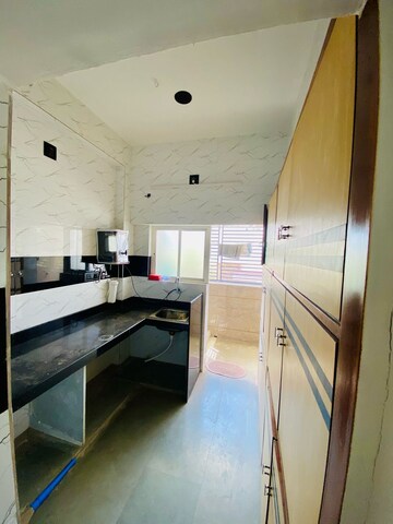 Kitchen in 2 BHK Apartment at Ashram Road – for Rent