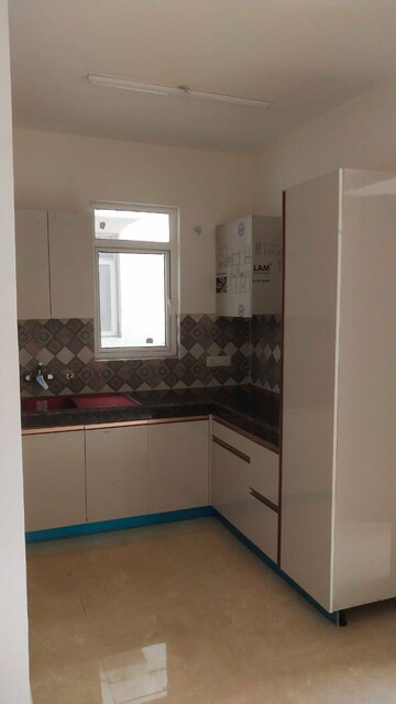 Kitchen in 2.5 BHK Apartment at Signature Global Park 4 and 5, Sohna Sector 36 – for Rent